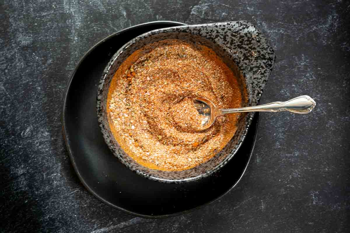 Homemade blackened seasoning in a black bowl.