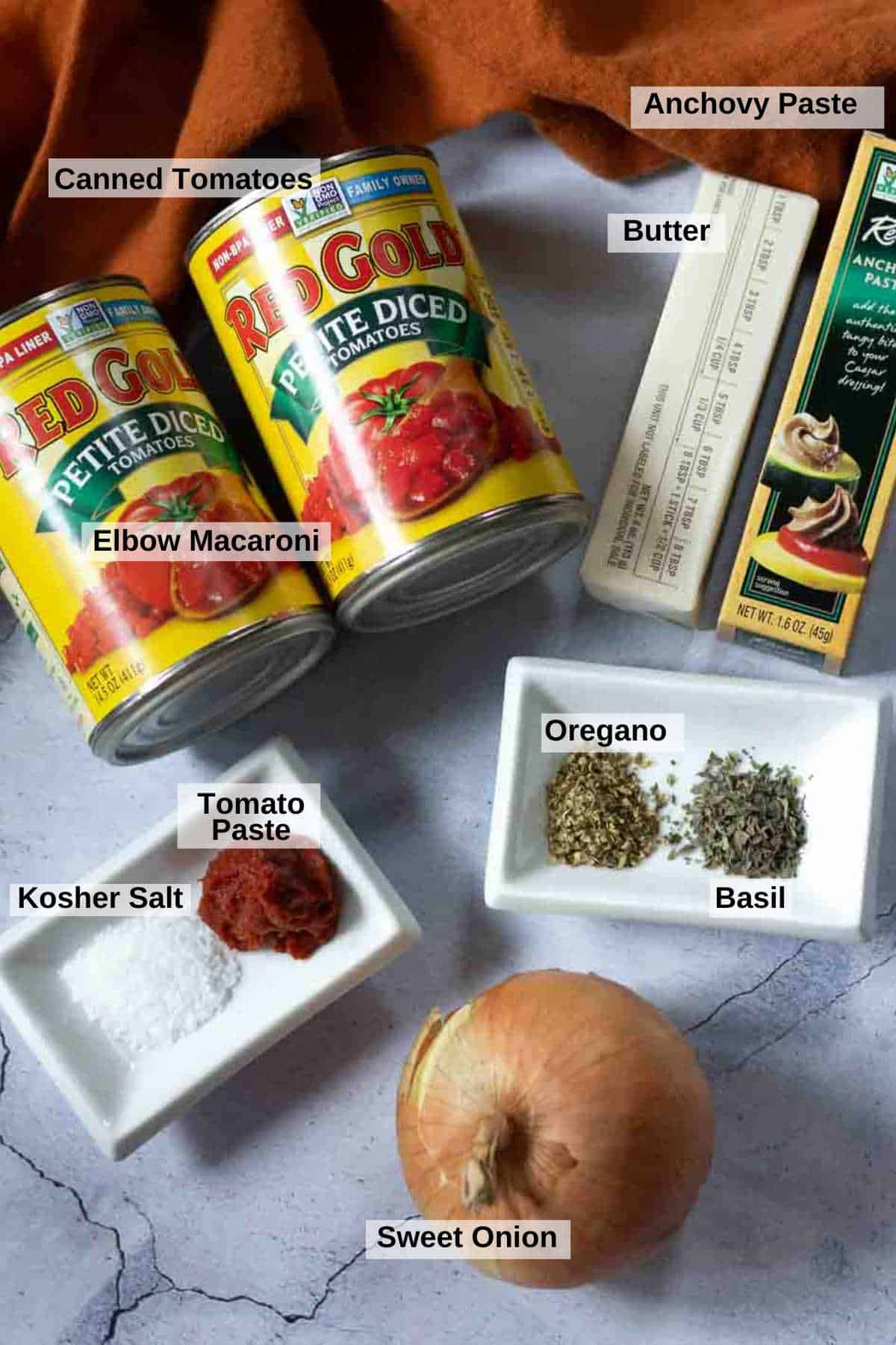 Ingredients to marinara sauce for shrimp and polenta.