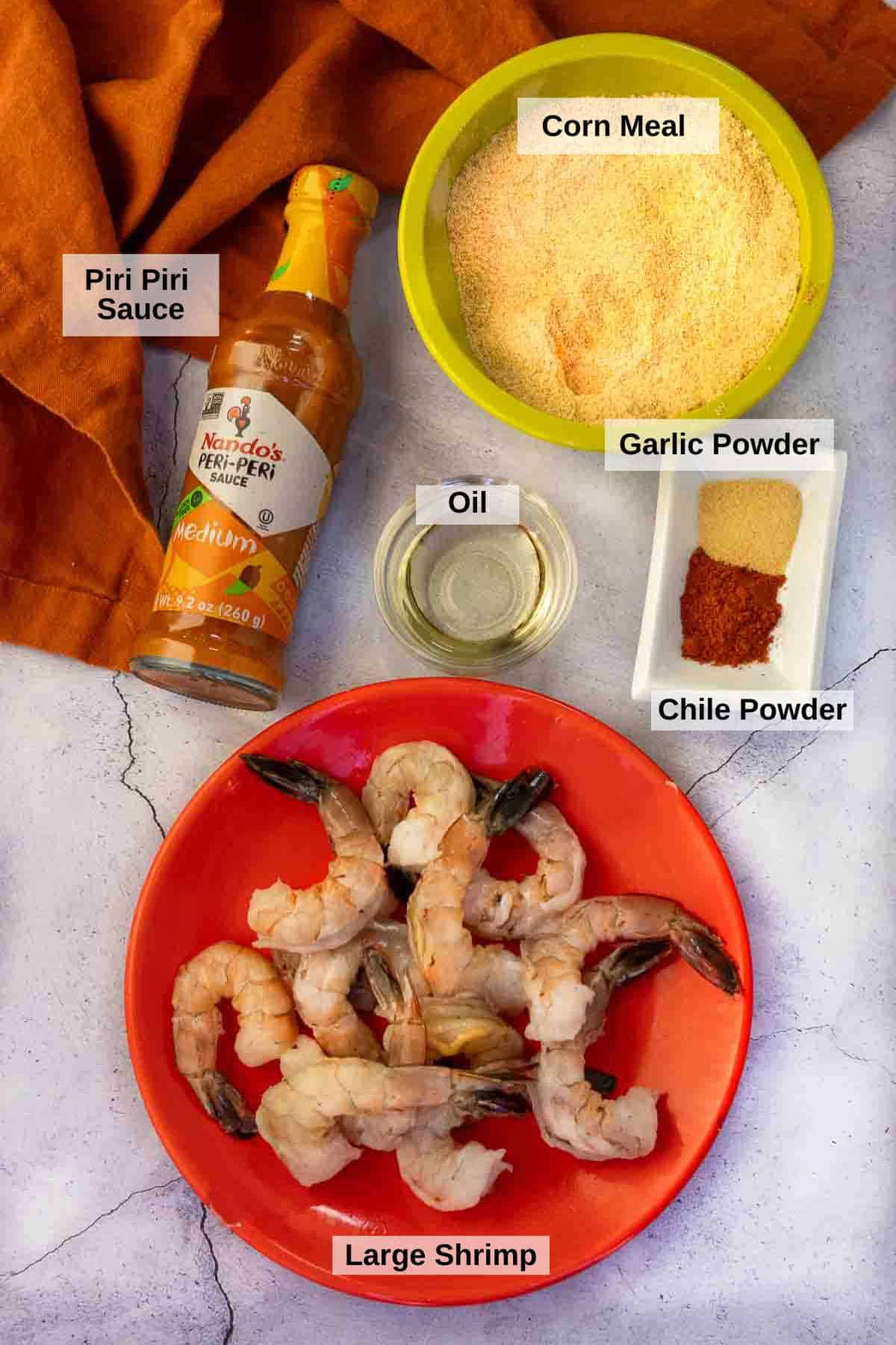 Ingredients to make spicy breaded shrimp.