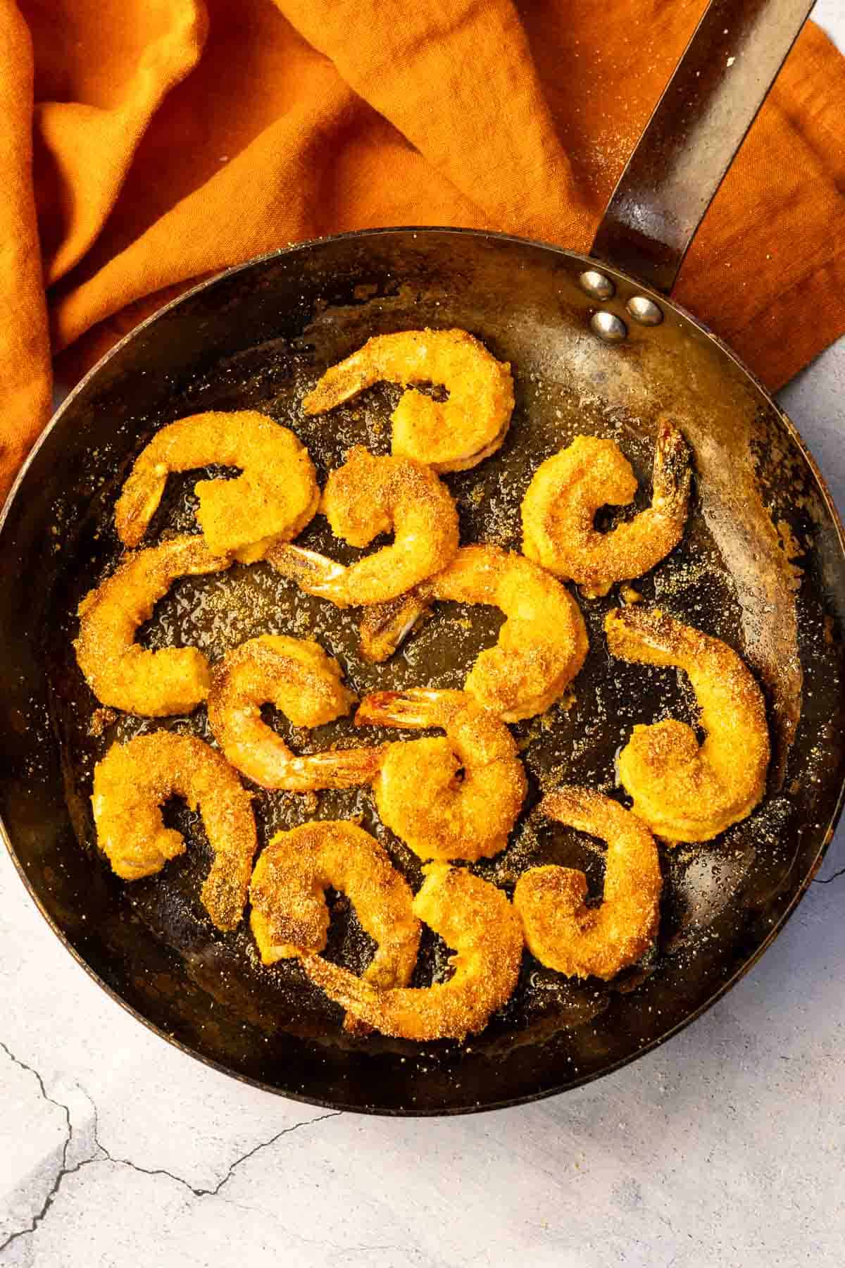 Pan frying shrimp to make Shrimp and Polenta.