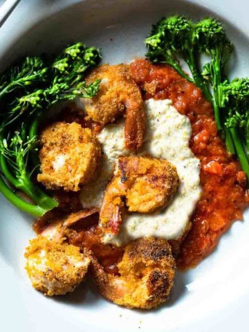 Shrimp and Polenta with marinara and baby broccoli.