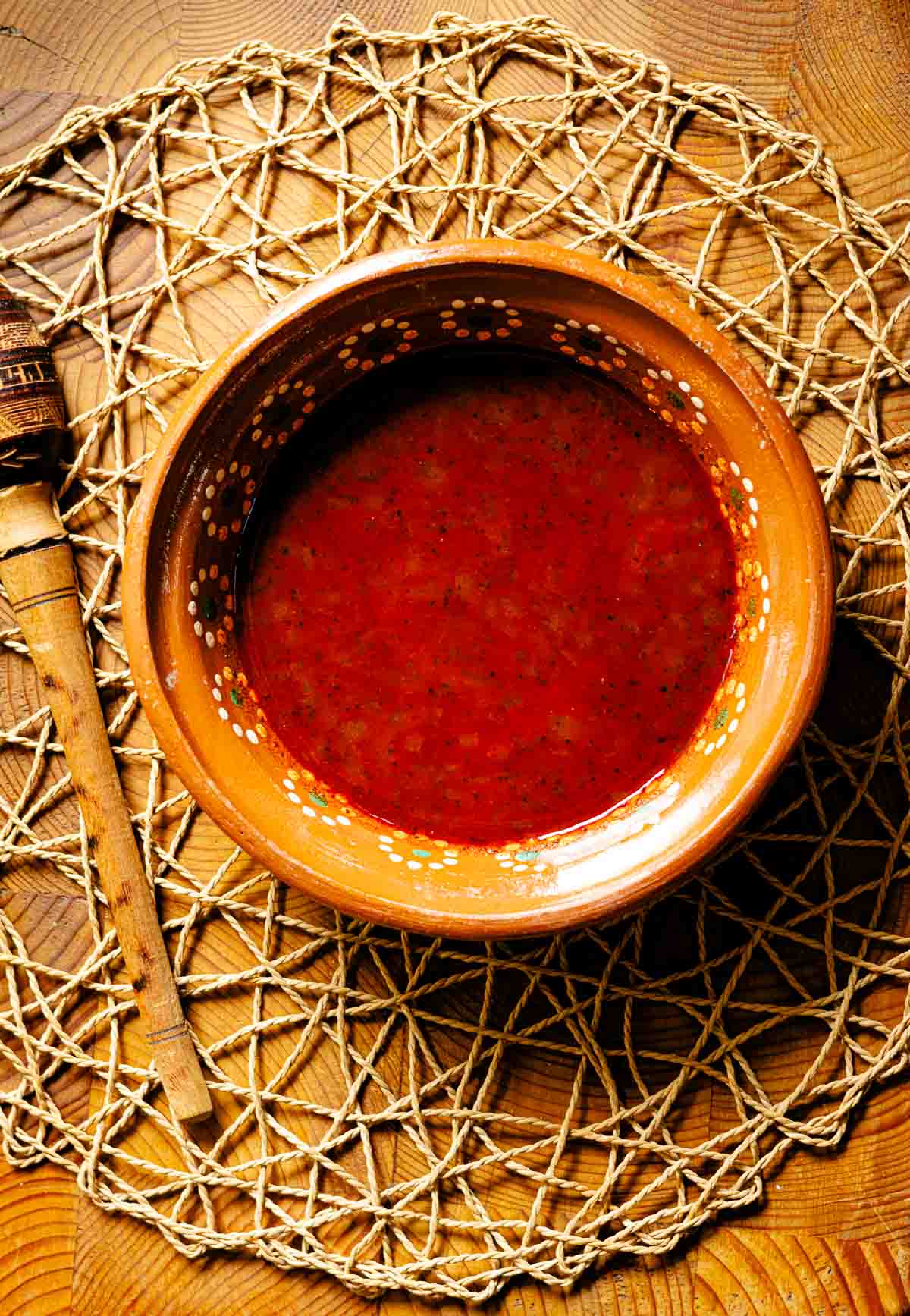 A bowl of red chile sauce made from red chile powder.