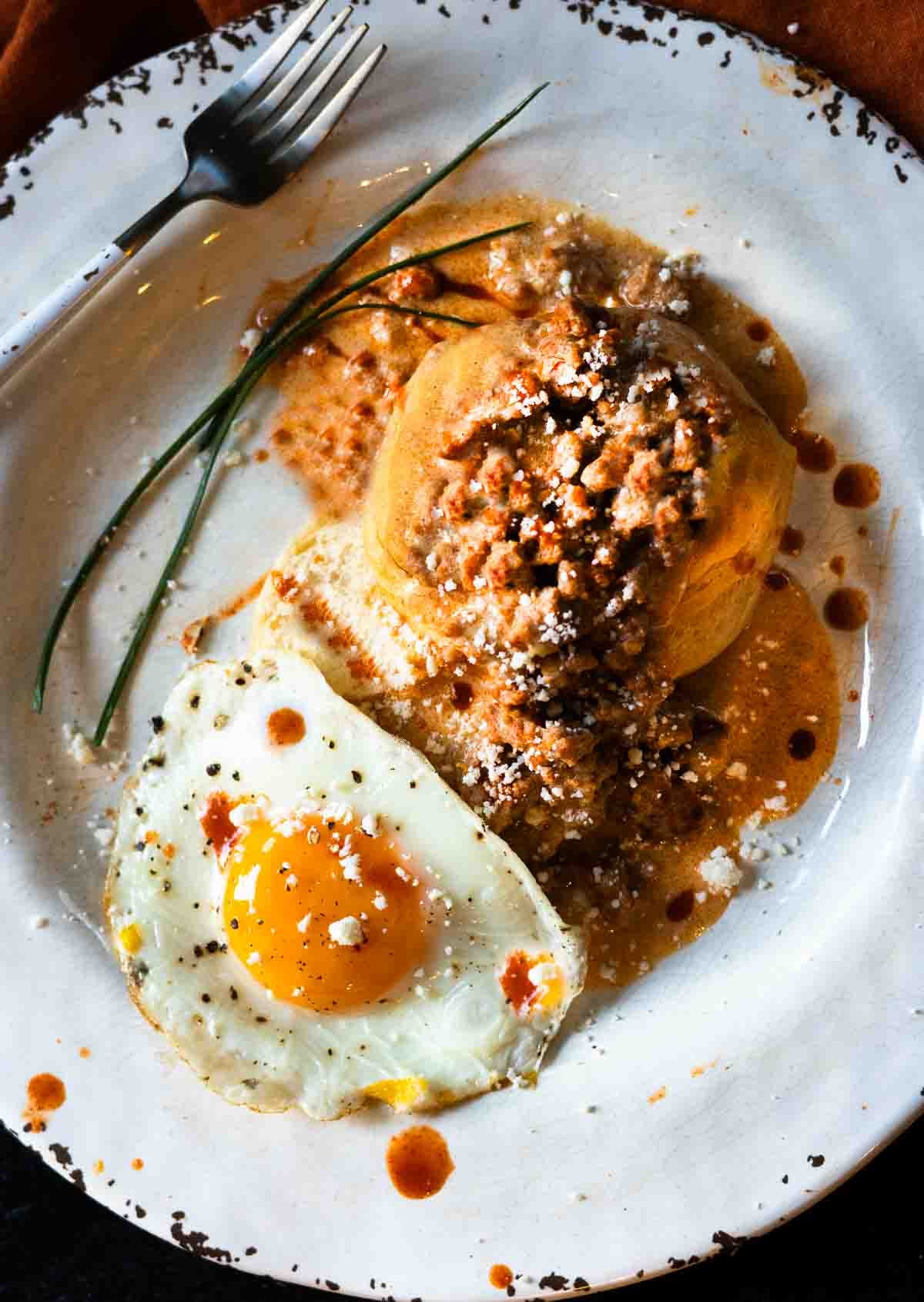 Chorizo gravy over biscuits and served with a fried egg.