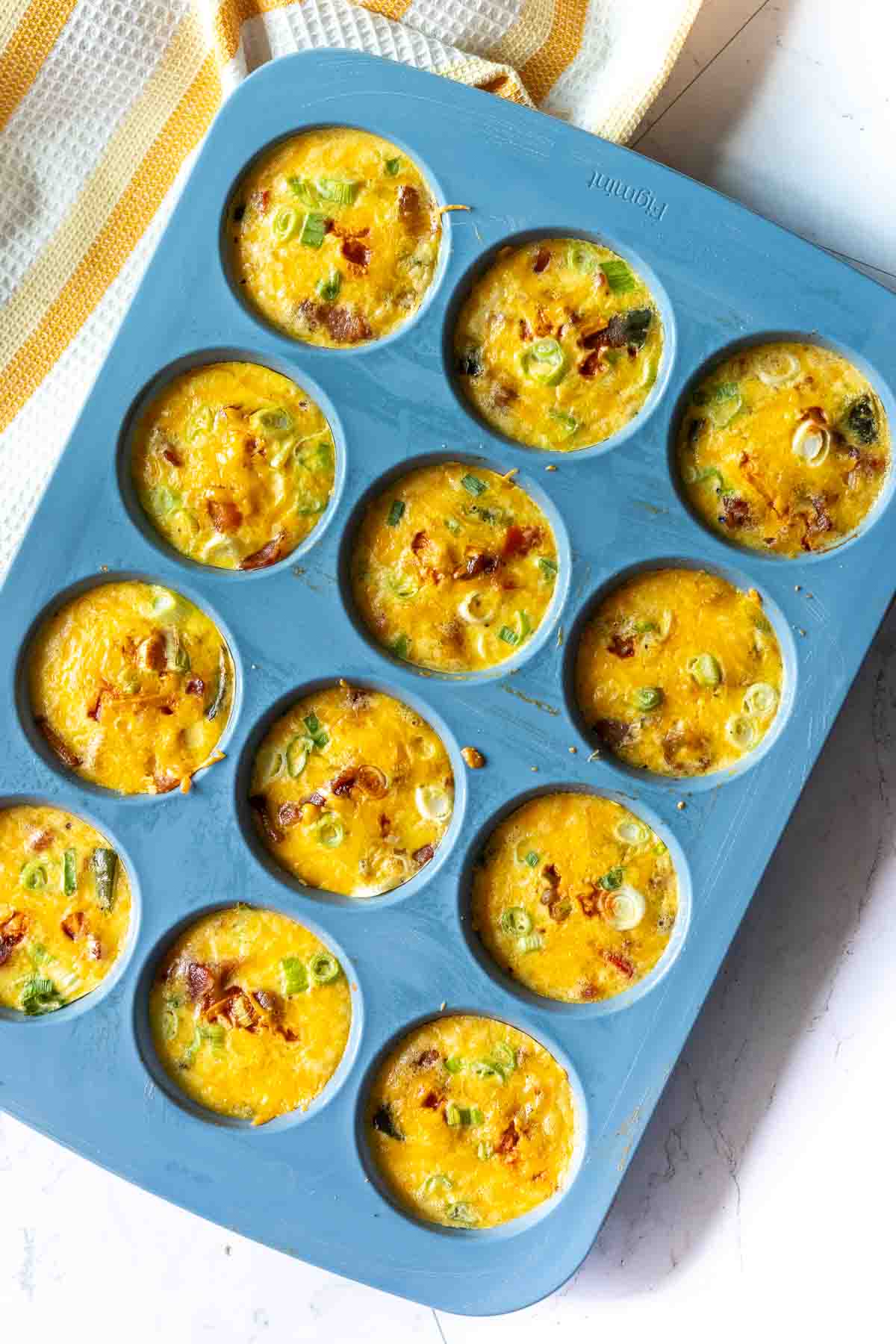 Baked Cottage Cheese Egg Bites in a silicone muffin tin.