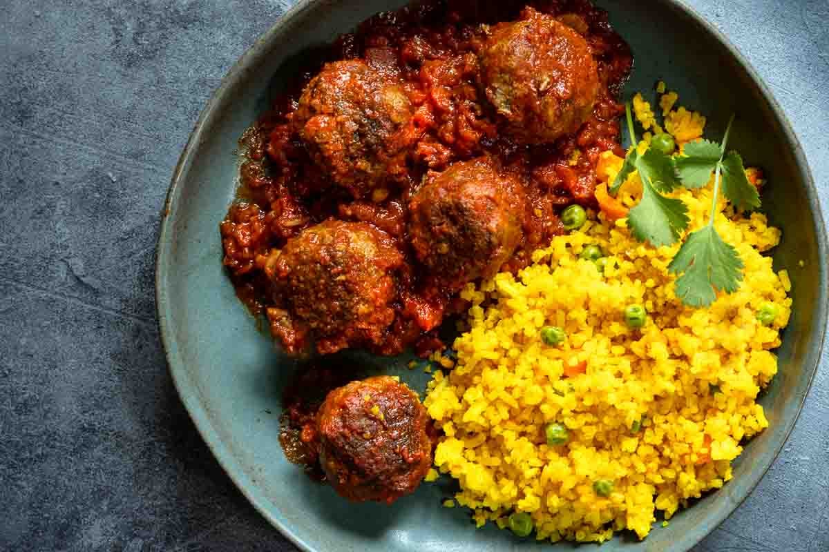 Bison meatballs with chipotle salsa served with yellow rice.