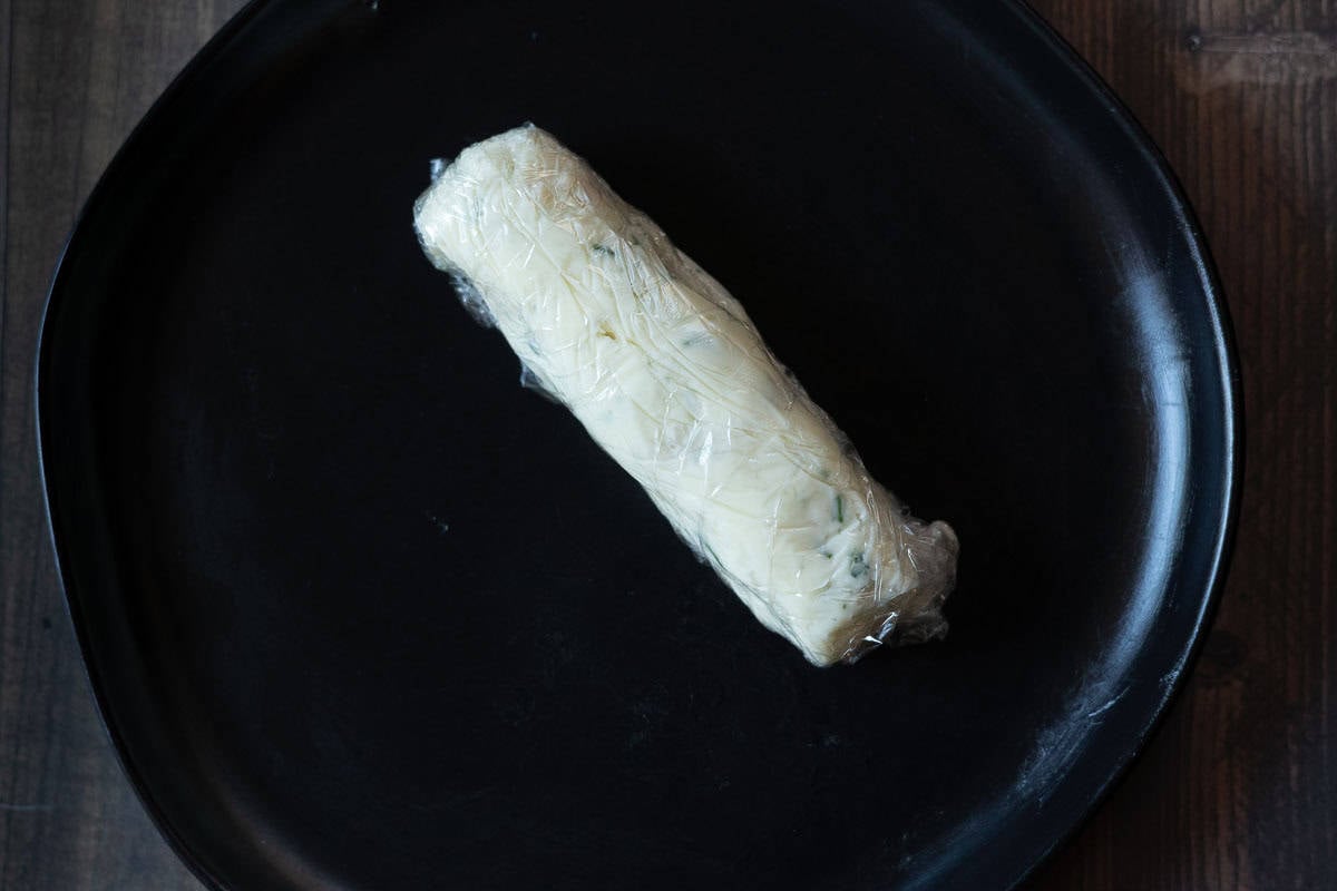 A roll of blue cheese butter for merlot steak.