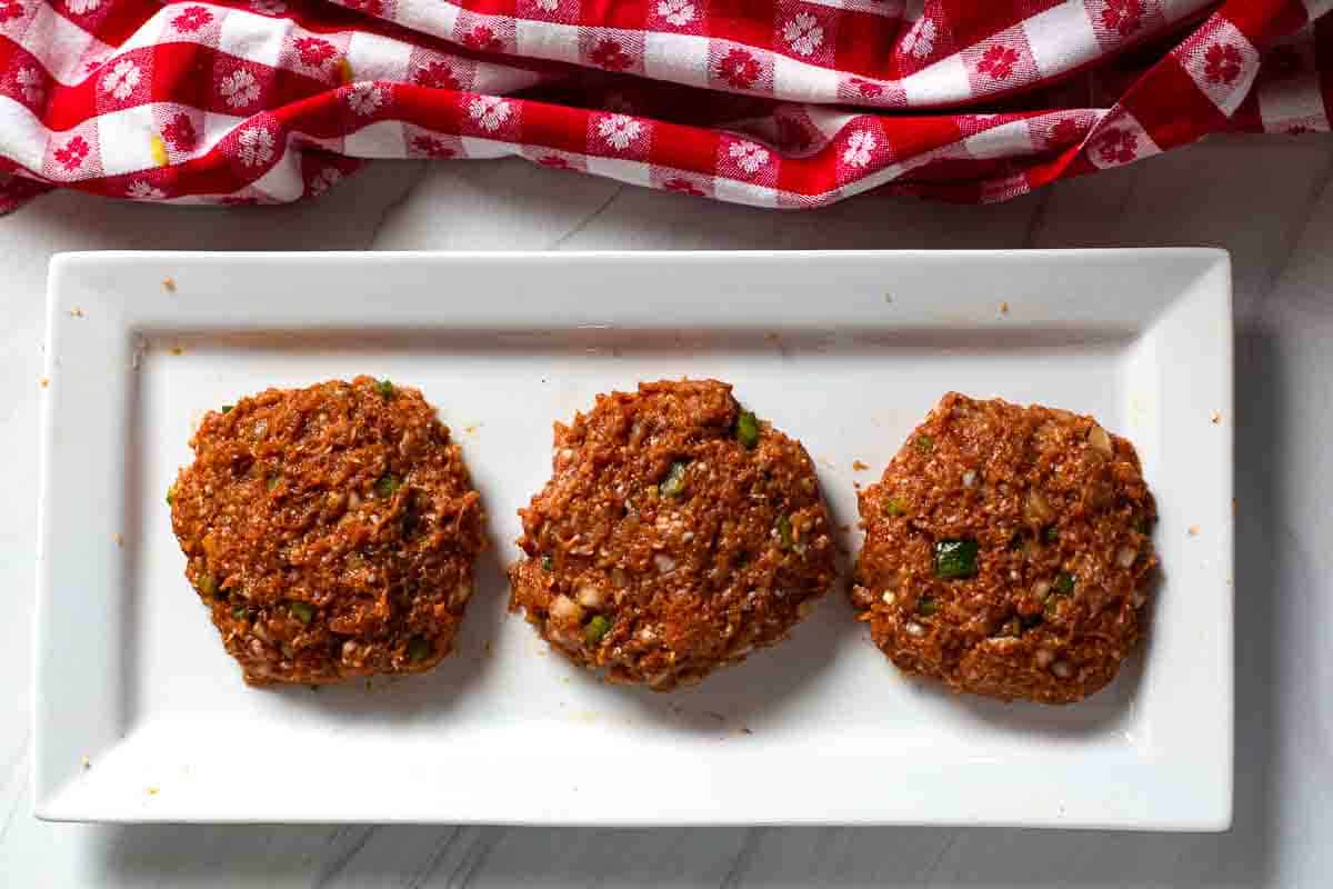 Three turkey burger patties.