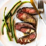 Pan Fried Baseball Top Sirloin steak served with green beans.