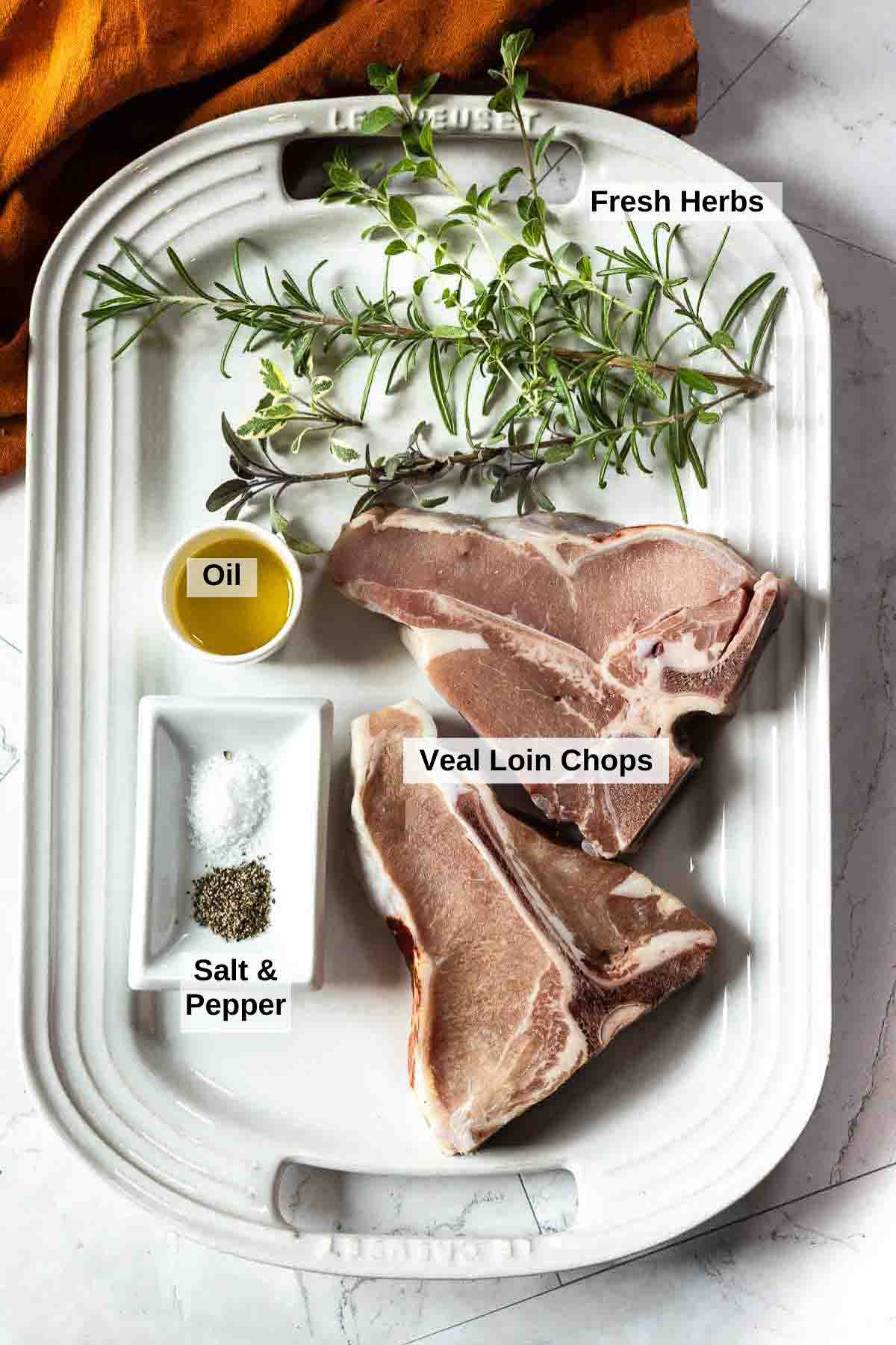 Ingredients to make pan-seared veal chops.
