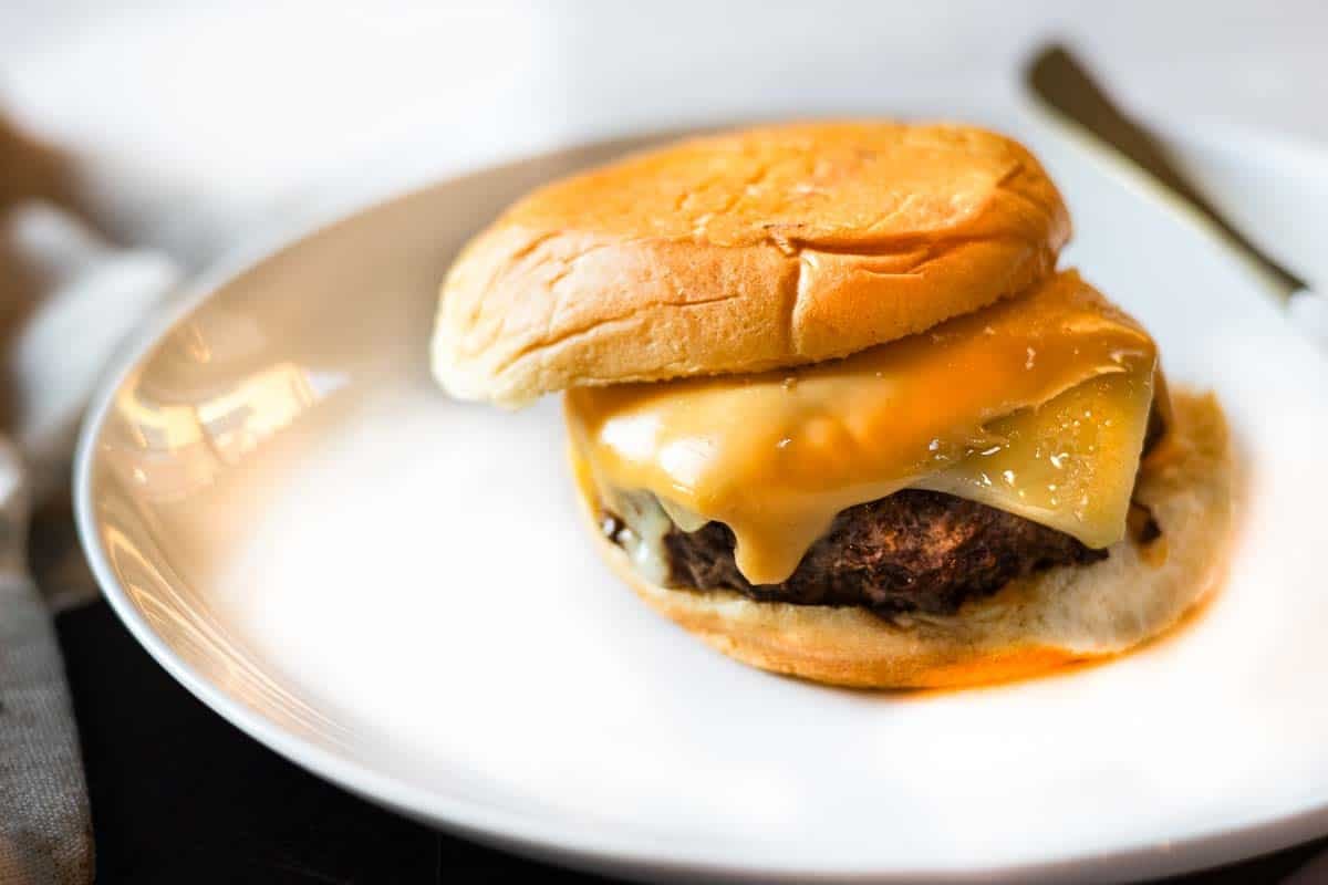 Maverick burger with American and Swiss Cheese.
