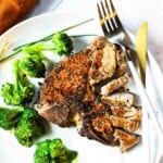 Pan seared veal loin chops served with broccoli.