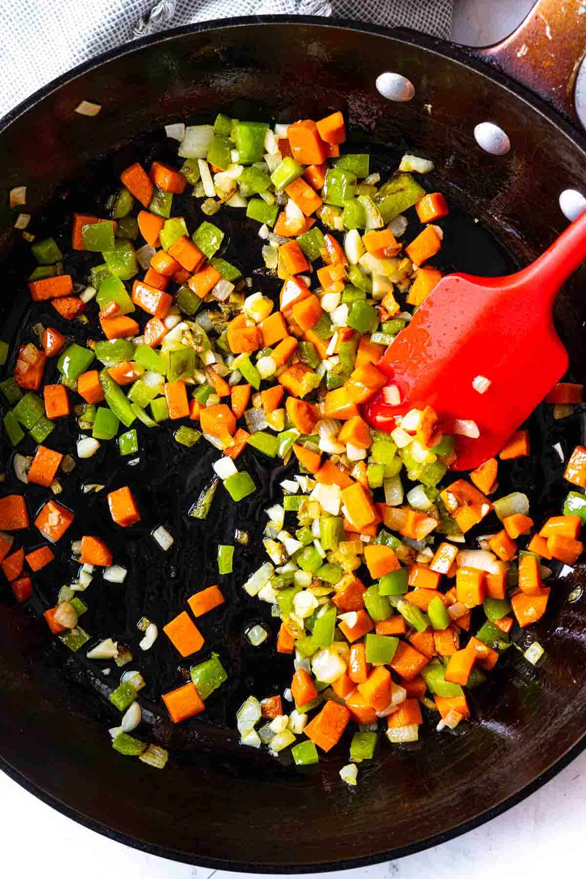 Step 4: Cooking vegetables to make Chicken and Cabbage Soup.