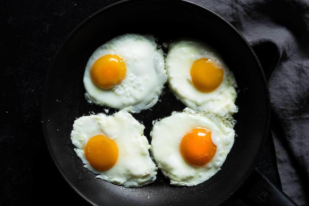 Frying eggs to make Southwestern New Mexico Huevos Rancheros.