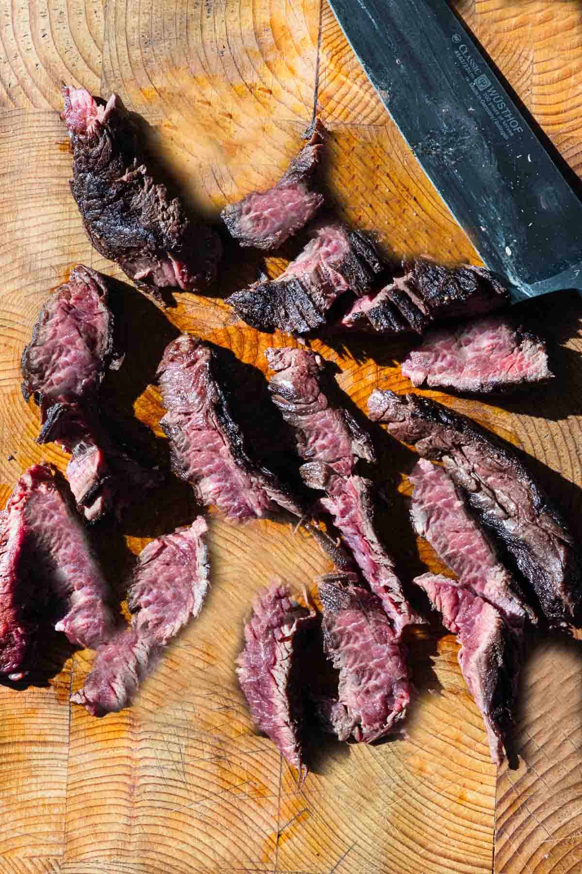 How to slice hanging tender steak against the grain.